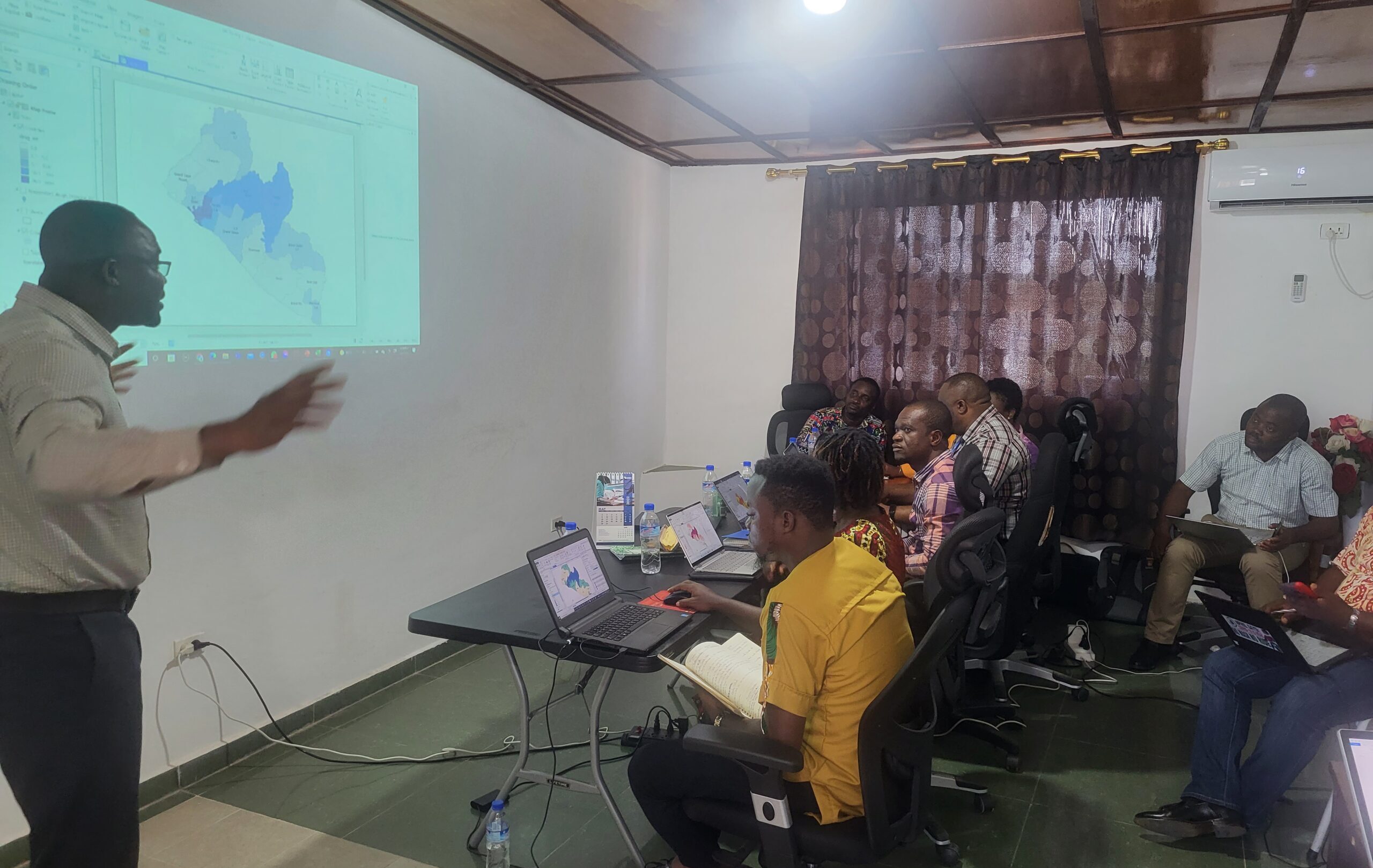 Godwin Akpan, GIS/IT Specialist (AFENET Liberia) guiding participants through map production during GIS capacity building training at Sinkor, May 2022