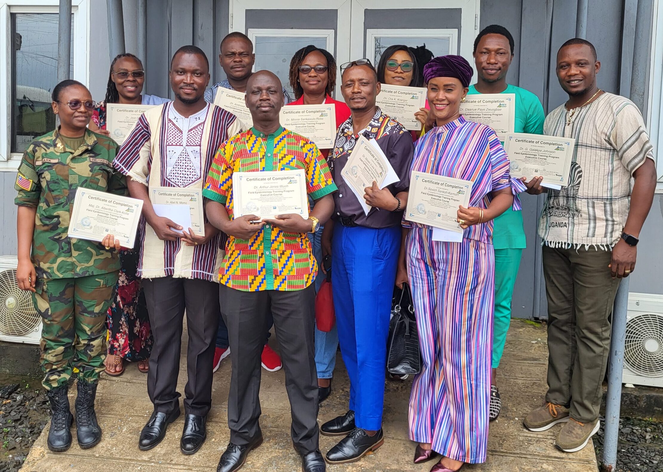 Liberia FETP Executive Cohort 3 graduates posing with their certificates